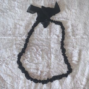 Black beaded necklace with ribbon tie